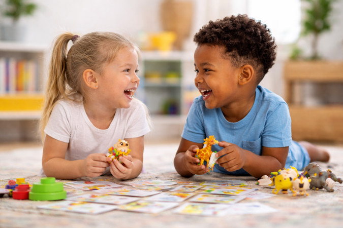 Children playing together during speech therapy session